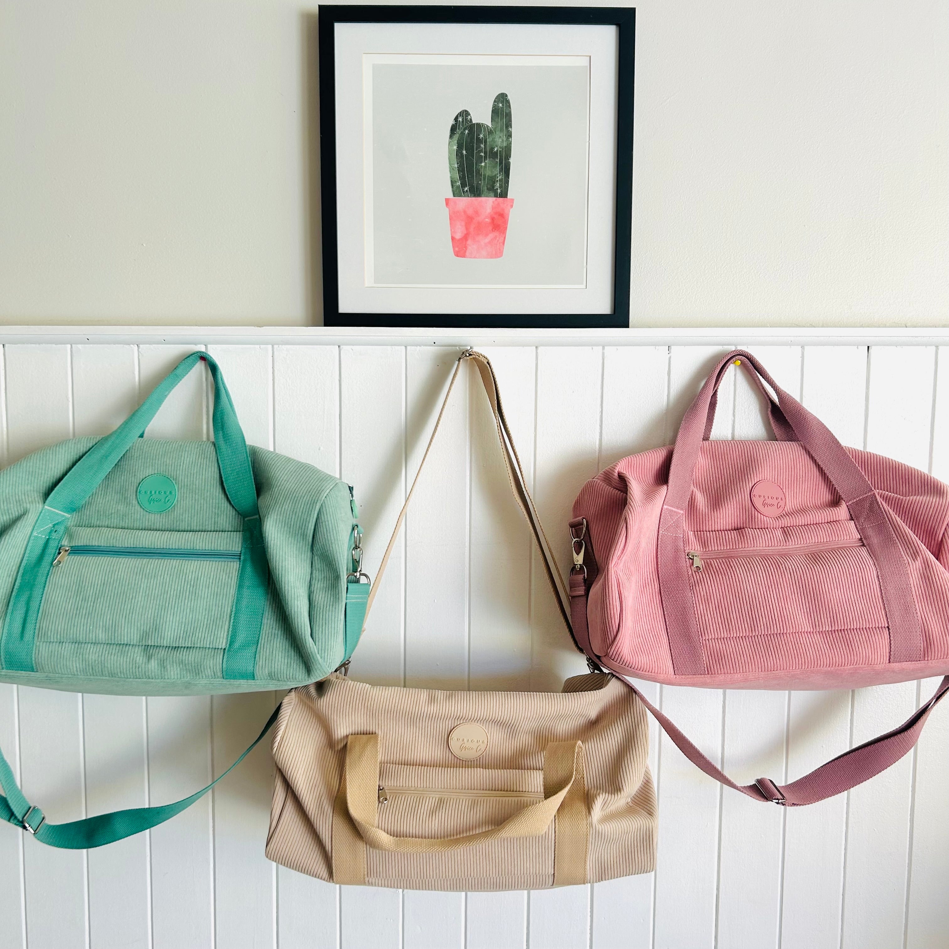 pink, beige and green overnight duffle corduroy bags by Curious Grace Co.