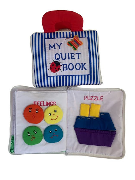 blue and white stripe cloth activity book displaying different feelings and Velcro boat puzzle