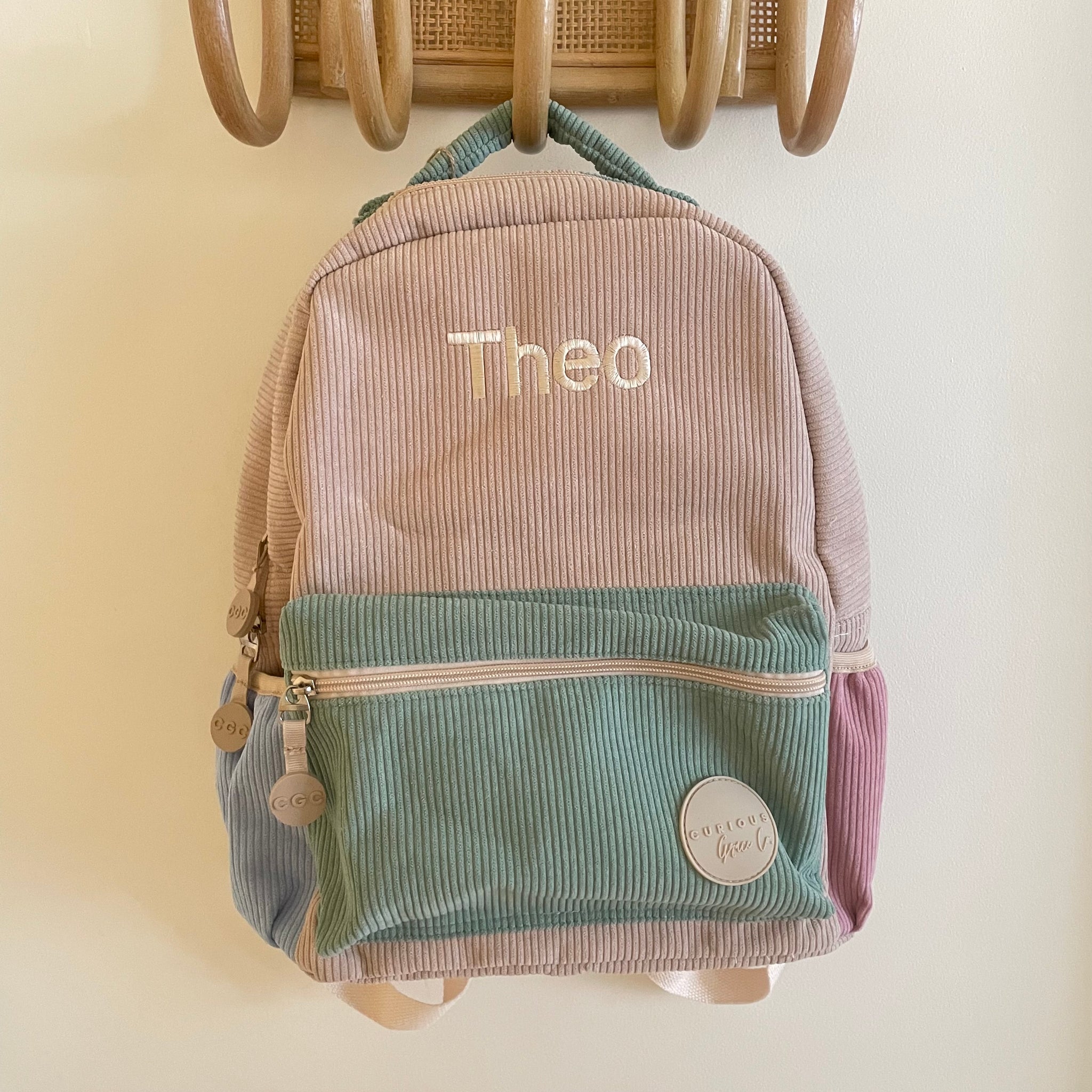 Personalised corduroy Backpack for Theo in multi colours 