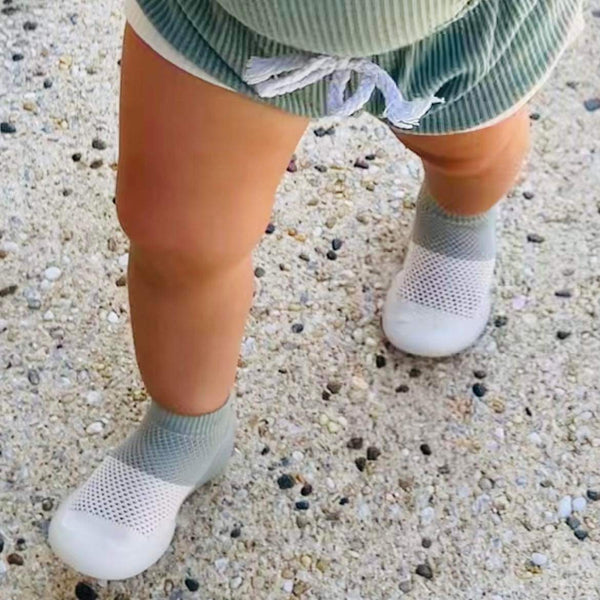 Tiny Treads Pre-walker baby shoes. Perfect shoes for toddlers for summer. Pink and sage mesh rubber sole shoes on cute toddler feet. 