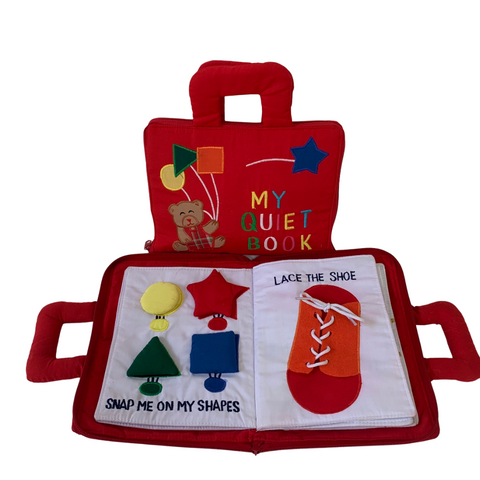 red cloth activity book with matching colour shapes and lacing the shoe